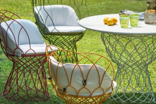 Sedie in acciaio verniciato e cuscini imbottiti